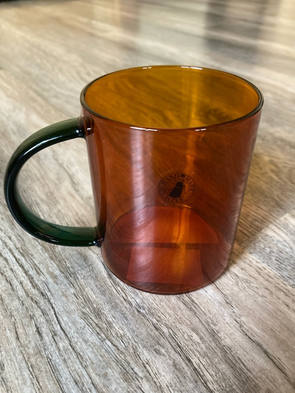 IKEA Amber Glass Mug with Green Handle